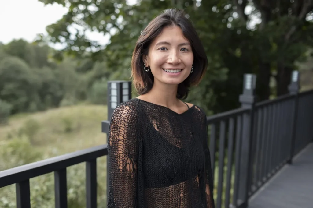 portrait woman having video call with her family
